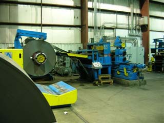 Slitting line — master coil staged at the Performance Master processing line.